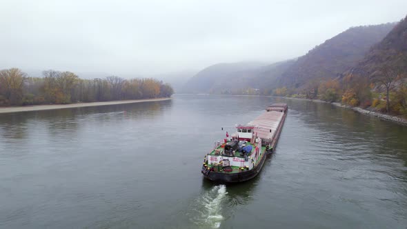 Cargo Pusher Boat on a Foggy Morning on the River Danube