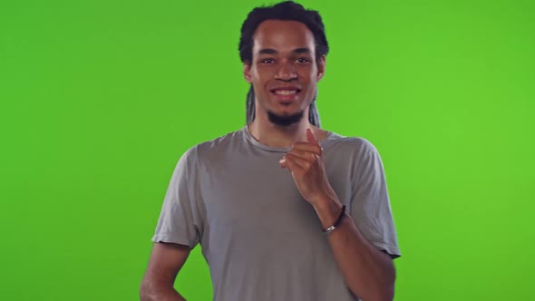 Young African American Man Dances and Moves Rhythmically Stands on Studio