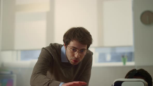 Portrait of Young Schoolteacher Explaining Lesson to Student in 3d Vr Glasses