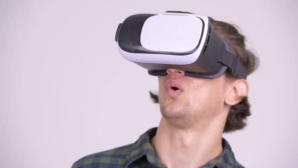 Face of Handsome Hipster Man Using Virtual Reality Headset