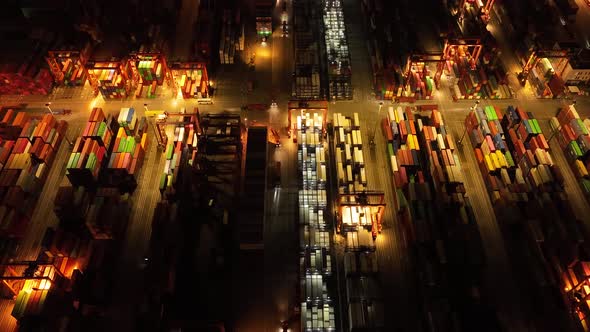 Aerial footage of Yantian international container terminal at night in Shenzhen city, China, Hyperla