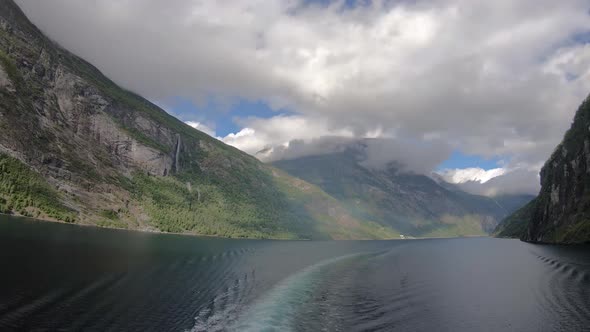 Time lapse video of cruise ship leaving Gerianger fjord in Norway and make 360° turn in summer