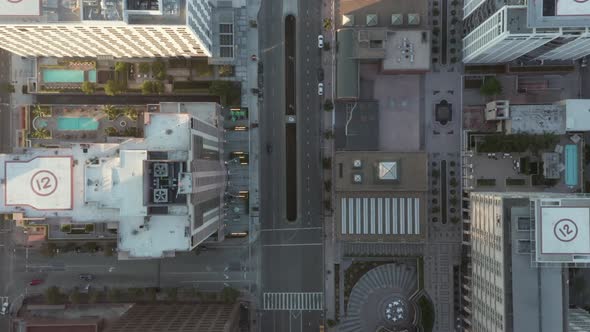 AERIAL: Breathtaking Overhead Birds Eye View of Downtown Los Angeles California in Beautiful Sunset