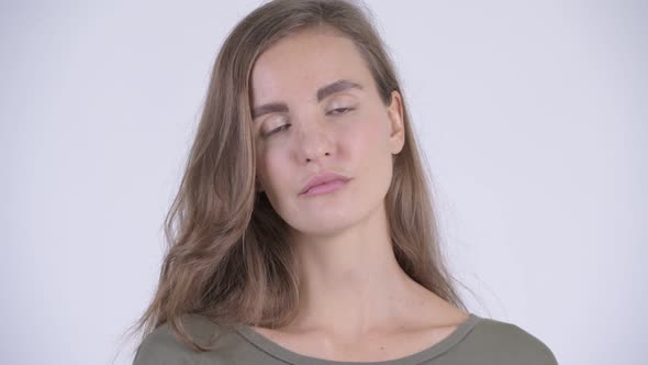 Face of Young Stressed Woman Looking Bored and Tired