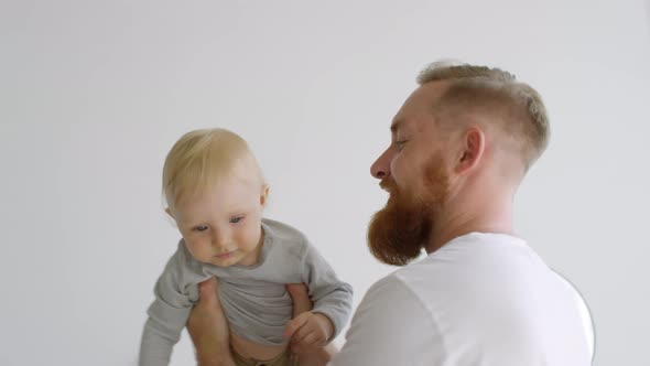 Father with Baby Twirling