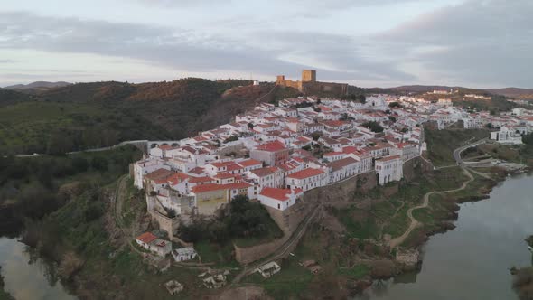 Aerial drone view of Mertola in Alentejo, Portugal at sunset