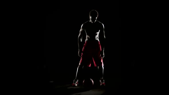 Man Play Basketball Isolated on Black