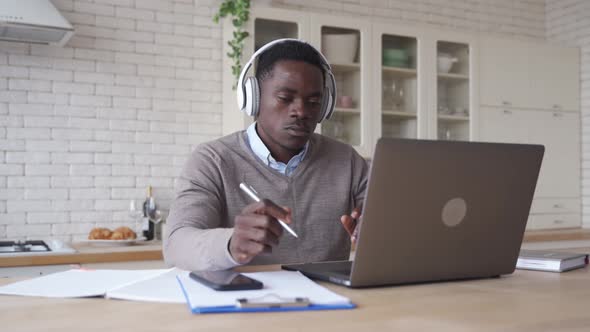 African Business Man Talking Video Conference Calling at Home Office