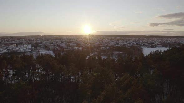 Sunset Over Small Town Near Forest