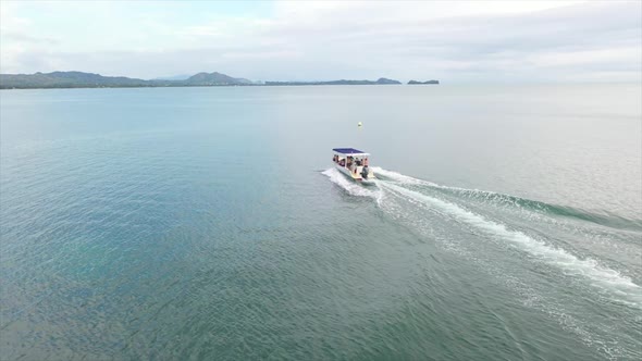 fly over of a small motor boat in the Indian Ocean off Madagascar