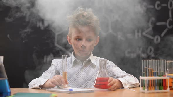 Funny Dirty Schoolboy Holding Chemistry Equipment, Explosion During Experiment