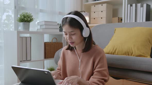 Woman using digital tablet and video call with learning online on internet