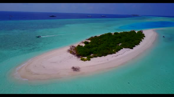 Aerial top down sky of idyllic coast beach break by transparent ocean and white sand background of a