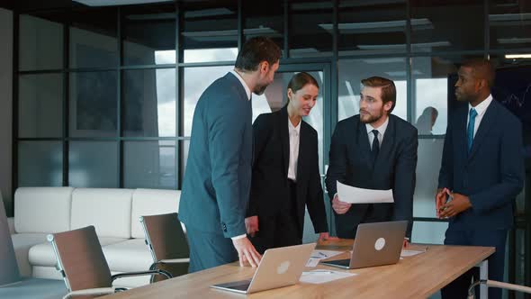 Young people at a business meeting. Business partners applauding