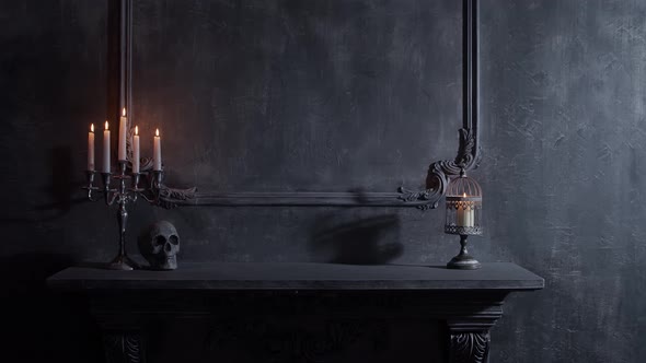 Mystical Halloween still-life background. Skull, candlestick with candles, old fireplace.