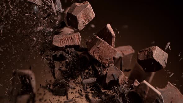 Super Slow Motion Shot of Raw Chocolate Chunks After Being Exploded at 1000Fps.