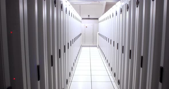 Empty hallway of server towers