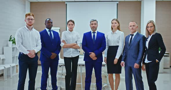 Team of Businessmen of Different Nationalities Stands in a Row