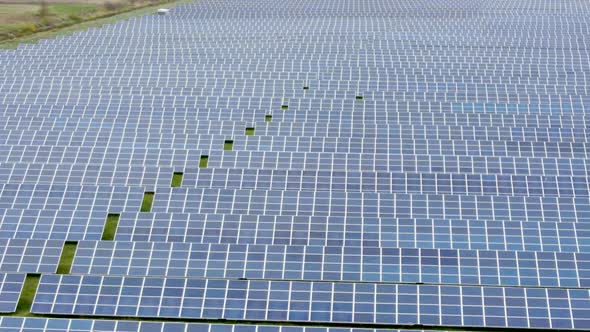 Aerial View of Solar Power Plant on Green Field