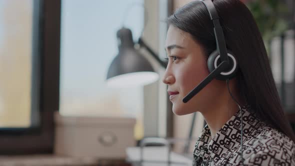 Close Up of Worker Talking on Phone Call at Customer Service