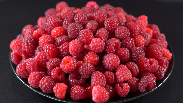 Fresh, ripe, juicy red raspberry background, close up berry, rotation, macro