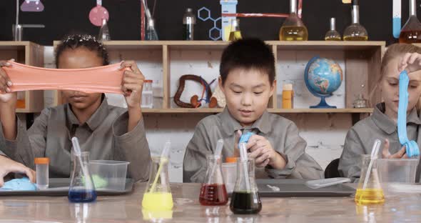 Сhildren's Learning Process, Kids Play with Colored Slime, Children's Laboratory for Teaching