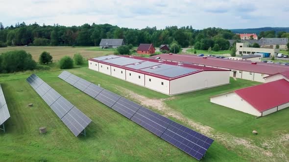 Solar power panels on roof and yard at factory (approx. 700 panels with 250 kW power)