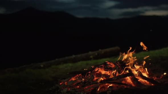 Closeup Camp Fire Burning in Dark Evening Night Mountains Landscape Nature