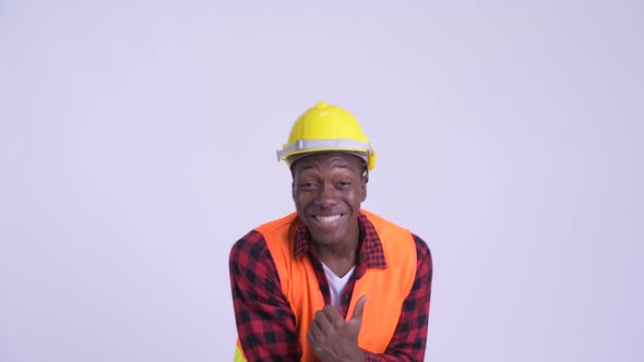 Young Happy African Man Construction Worker Getting Good News