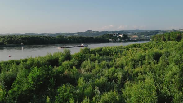 A slow bargeing upstream the Danube on a beautiful summer's day.