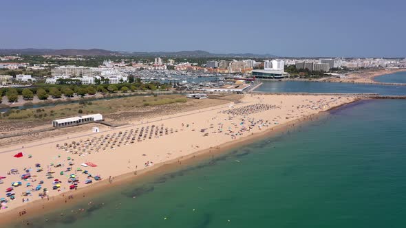 Aerial Video Beautiful Portuguese Beaches Near the Tourist Town Vilamoura Falesia with a View of the