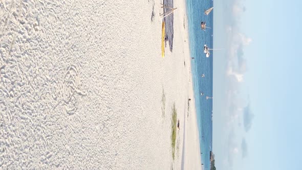 Vertical Video of the Beach on Zanzibar Island Tanzania Aerial View