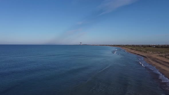 View From the Air to the Calm Sea in Bright Sunny Weather