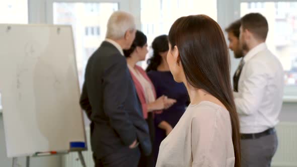 Young Business Woman Shows Her Thumb Up