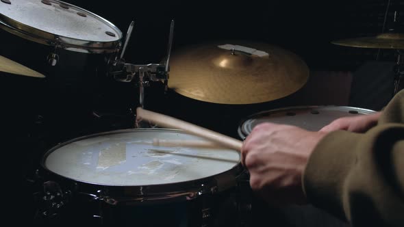 the Drummer Plays with Sticks on a Snare Drum Home Lesson Training