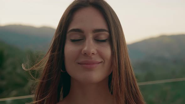 Closeup Portrait of Young Woman with Long Hair Open Eyes Looking Feel Happy the Morning Sun is