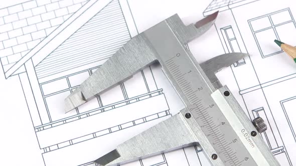 Calliper and Pencils on the Building Plan, Scheme, Rotation, Close Up