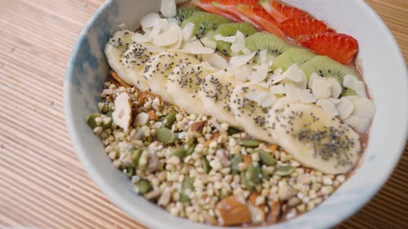 Healthy Vegan Bowl with Kiwi and Banana for Breakfast