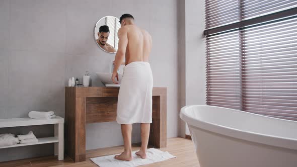 Naked Bare Sexy Muscular Arab Indian Man Enters Going Walking in Bath After Shower with White Towel