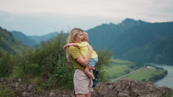 Positive Mother Taps and Strokes Boy Back at Highland