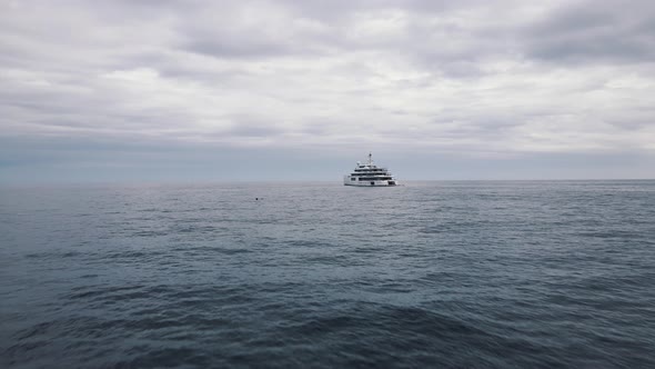 Private luxury yacht and small jet boat, aerial view.Private huge super yacht. South coast of Italy.