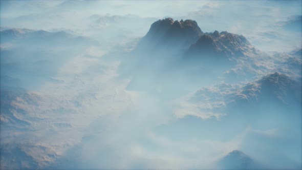 Distant Mountain Range and Thin Layer of Fog on the Valleys