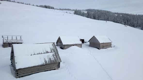 Flying Over Small Village in Carpathians Mountains