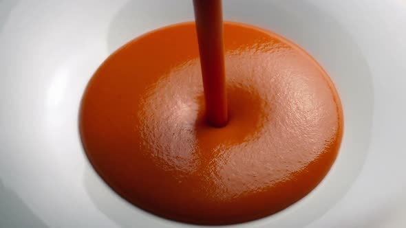 Tomato Soup Poured Into Bowl