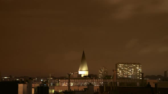 Timelapse of Clouds Racing Behind Church Steeple