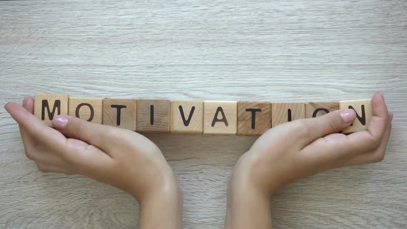 Motivation, Hands Pushing Word on Wooden Cubes, Positive Thinking Goals, Dreams