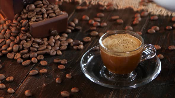 Brew Instant Black Coffee in Glass Cup on a Saucer