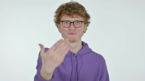 Redhead Young Man Pointing and Inviting, White Background