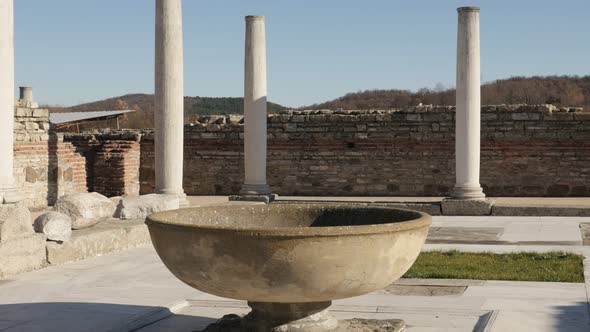 GAMZIGRAD, SERBIA - DECEMBER 25, 2017 Stone  fountain inside Felix Romuliana palace built by Roman E