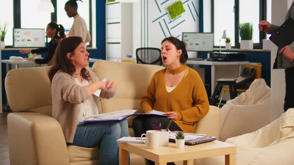 Stressed Busineswomen Arguing Yealing at Each Other During Work Hours